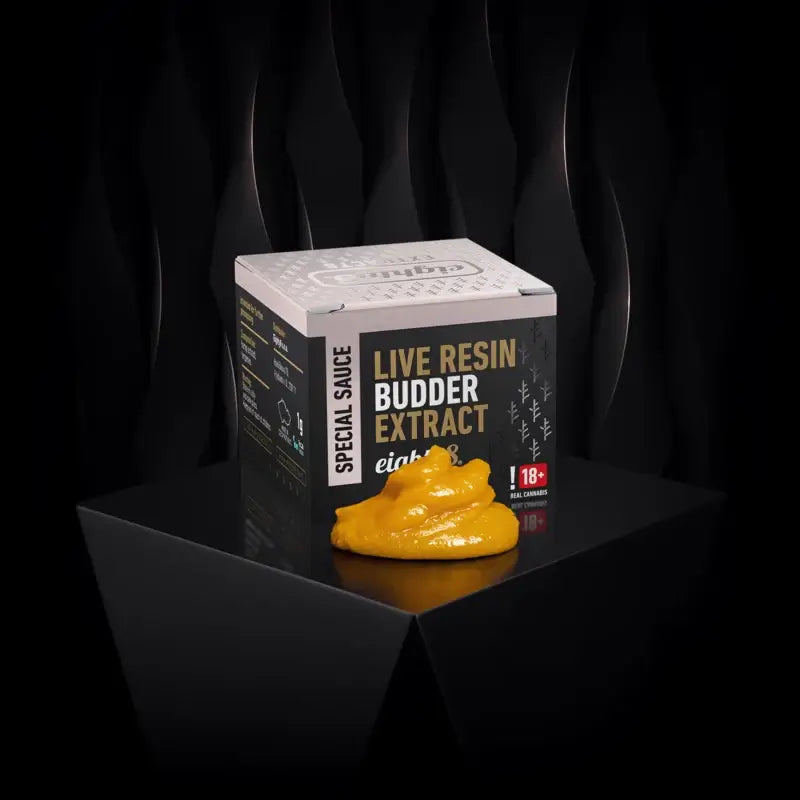 Eighty Live Resin Budder extract displayed on a sleek surface, showcasing its creamy texture and premium packaging.