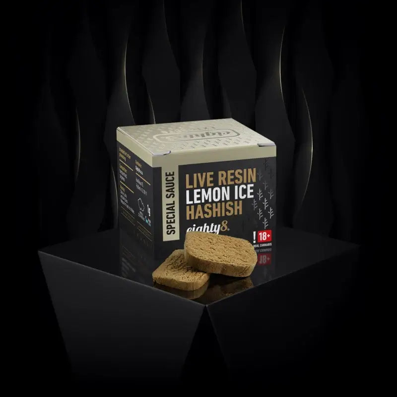 Eighty8 Live Resin Lemon Ice Hashish packaging with hash blocks, showcasing refreshing lemon flavor.